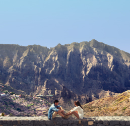 Couple at the Masca viewpoint with mountains in the background